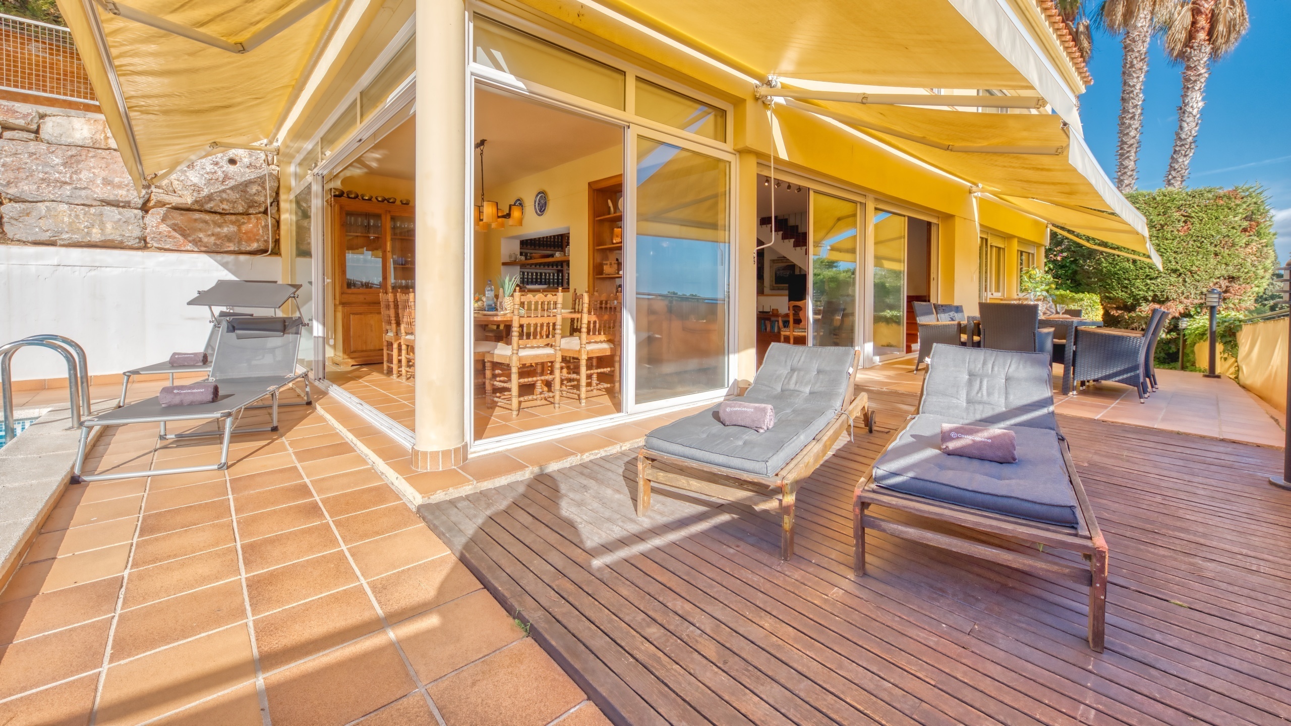 Holiday villas Costa Brava Spain - Villa Santa Cristina - Sunbeds